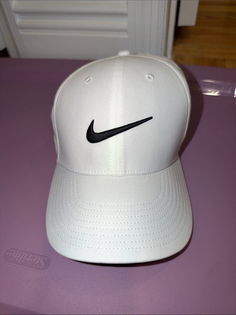 Nike White Baseball Cap with Black Swoosh Logo